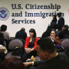 How to Prepare for Your Immigration Interview Immigrants waiting for Green Card interviews. Photo from npr.org